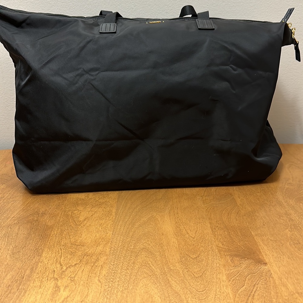 Tumi NWOT black Just in case tote never carried.